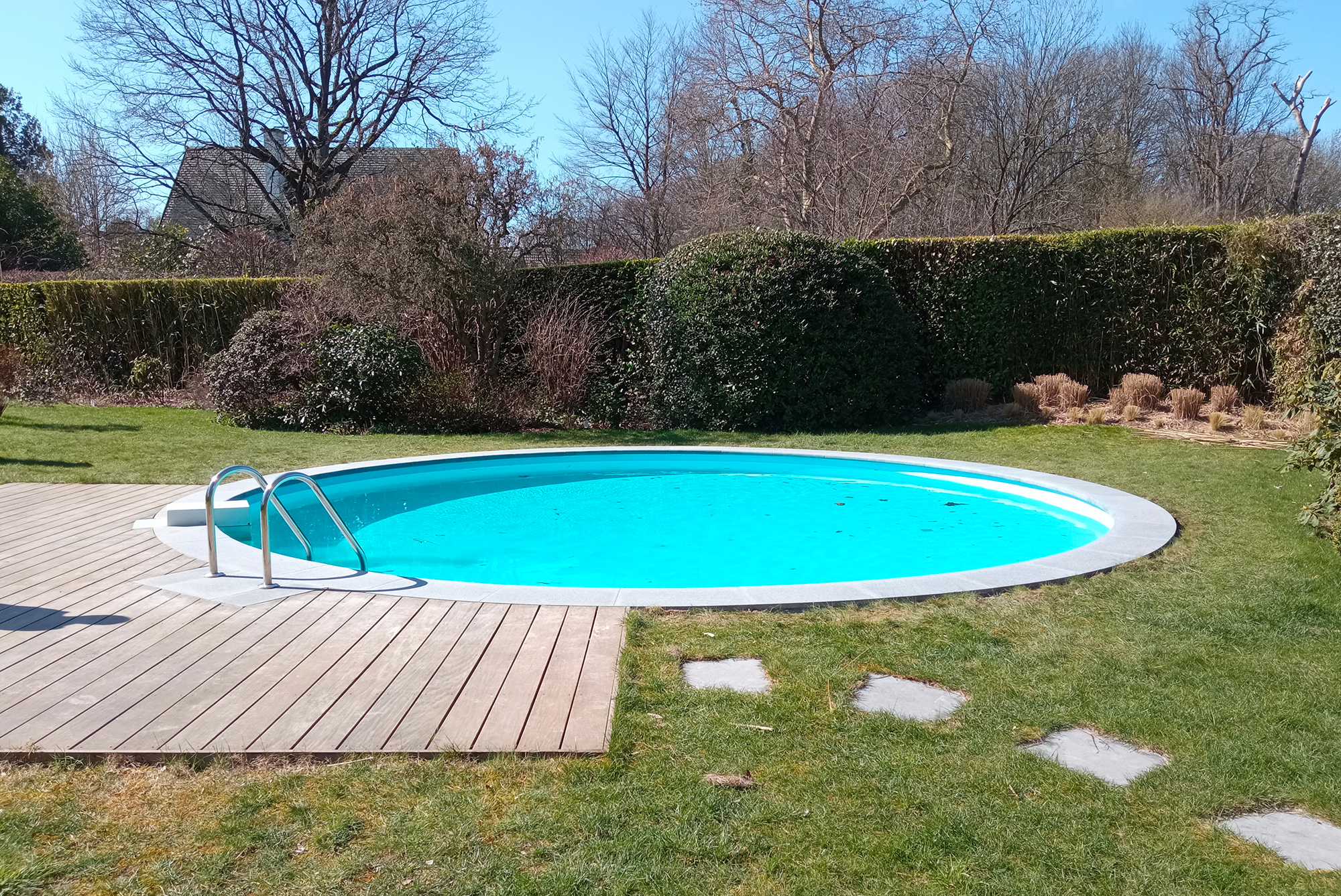 La piscine ronde avec terrasse bois